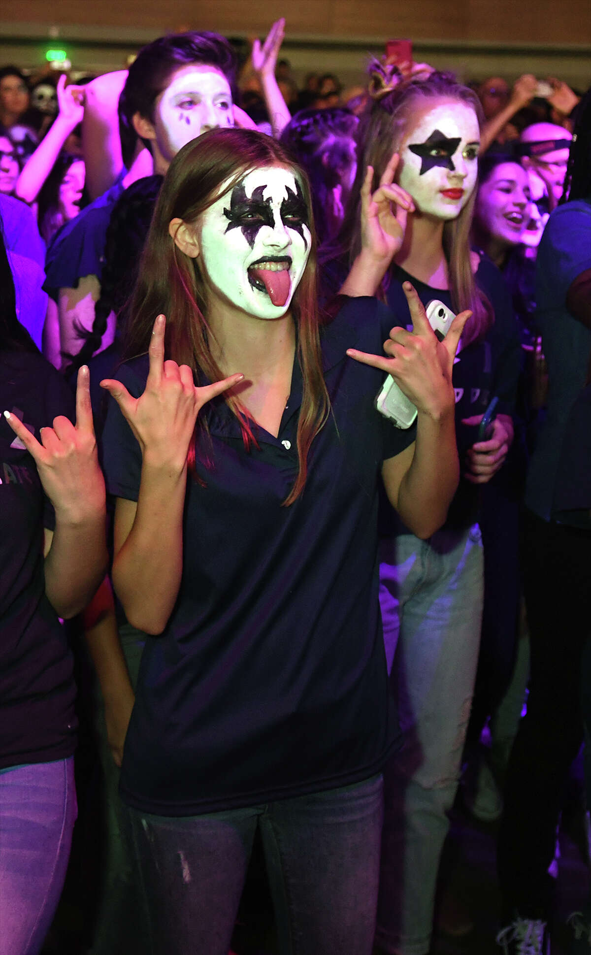 Kingwood High School students join KISS during their performance of "Rock and Roll All Night" during their fundraising campaign at Smart Financial Centre in Sugar land on Sept. 26, 2017. (Photo by Jerry Baker/Freelance)