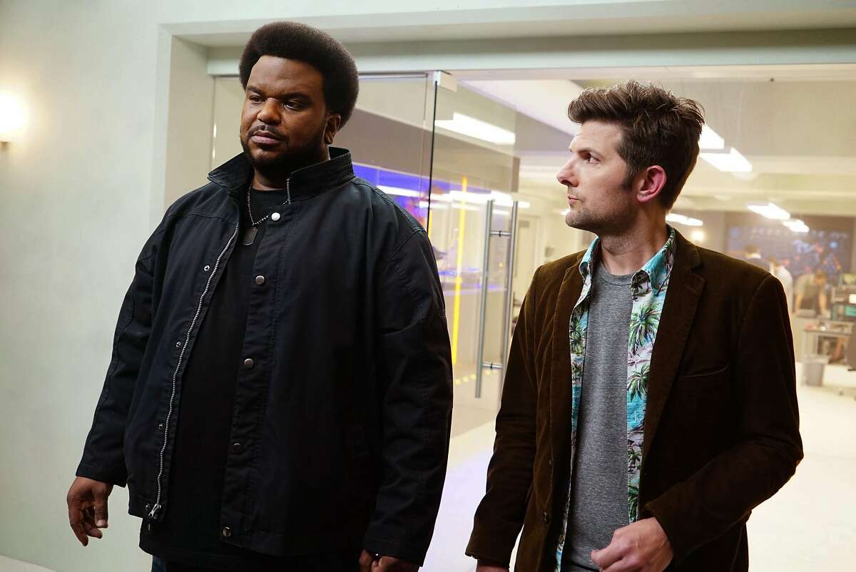 This image released by Fox shows Craig Robinson, left, and Adam Scott in a scene from "Ghosted," premiering Oct. 1 on Fox.