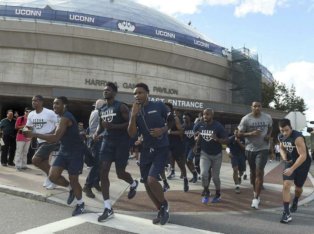 The UConn’s men's basketball team ended its summer workouts and unofficially began the new season Wednesday by completing the annual Husky run through the Storrs campus, starting at Gampel Pavilion.