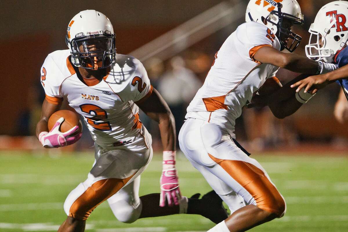 Madison running back Aaron Green looks for running room against Roosevelt at Heroes Stadium on Oct. 9, 2010.