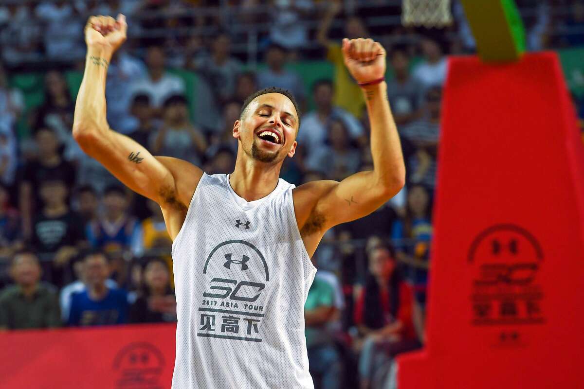 CHENGDU, CHINA - JULY 24: NBA star Stephen Curry of Golden State Warriors meets fans at University of Electronic Science and Technology of China on July 24, 2017 in Chengdu, China. (Photo by VCG/VCG via Getty Images)