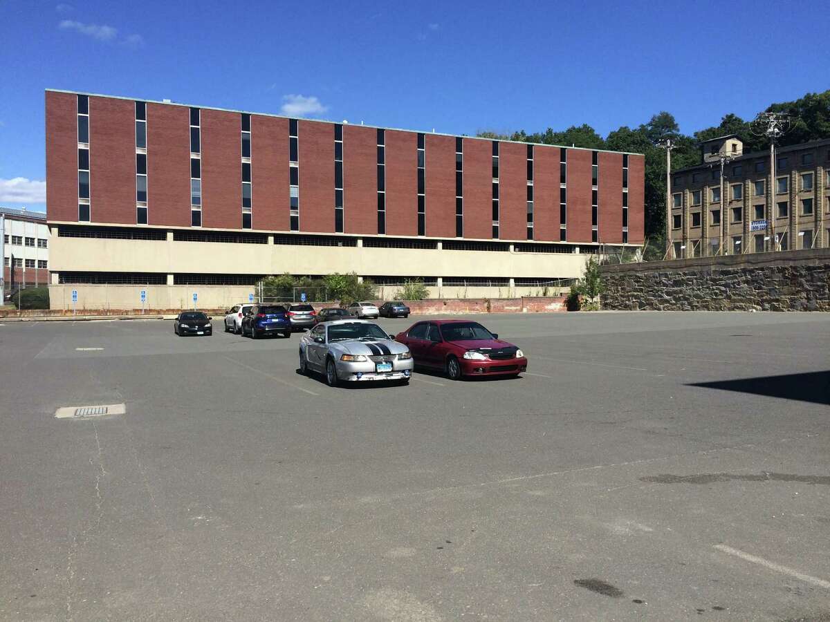 The parking lot outside the former Farrel Corporate headquarters on Ansonia’s Main Street has reopened to the public following an agreement between the city and its owner.