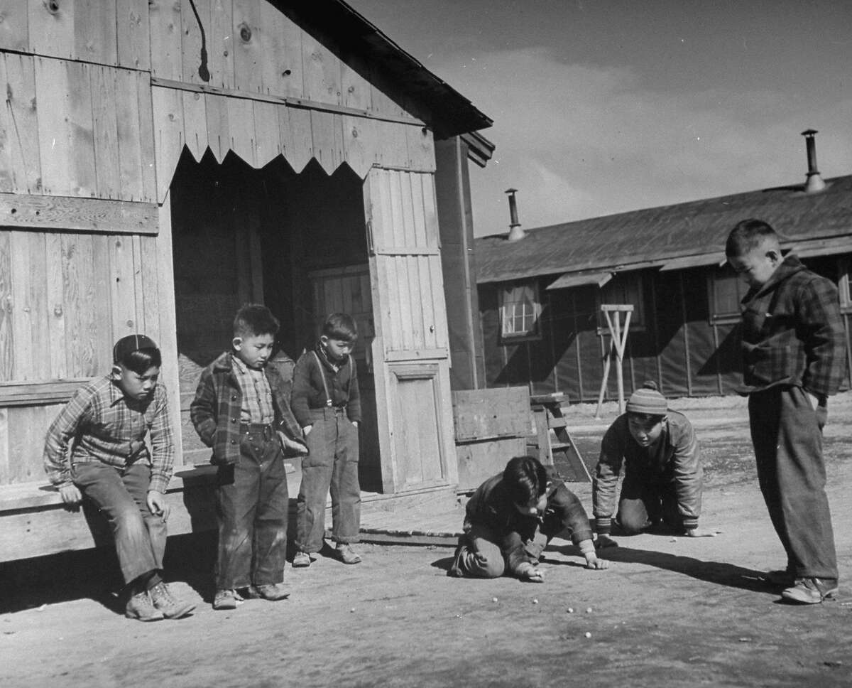 UNITED STATES - MARCH 01: Children at Japanese internment camp, Tule Lake, CA. (Photo by Carl Mydans/The LIFE Picture Collection/Getty Images)