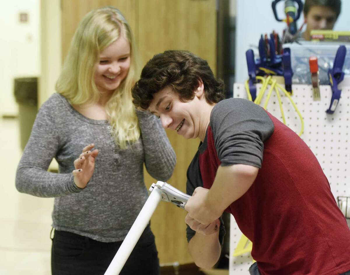 Junior Ben Wolff cuts a PVC pipe for a project as Sophie Anderlind watches during an Innovation Lab class at Greenwich High School in Greenwich, Conn. Thursday, Sept. 28, 2017. The STEM-focused Innovation Lab has expanded for the 2017-2018 school year by adding a grade, creating a new classroom and adding several new teachers.