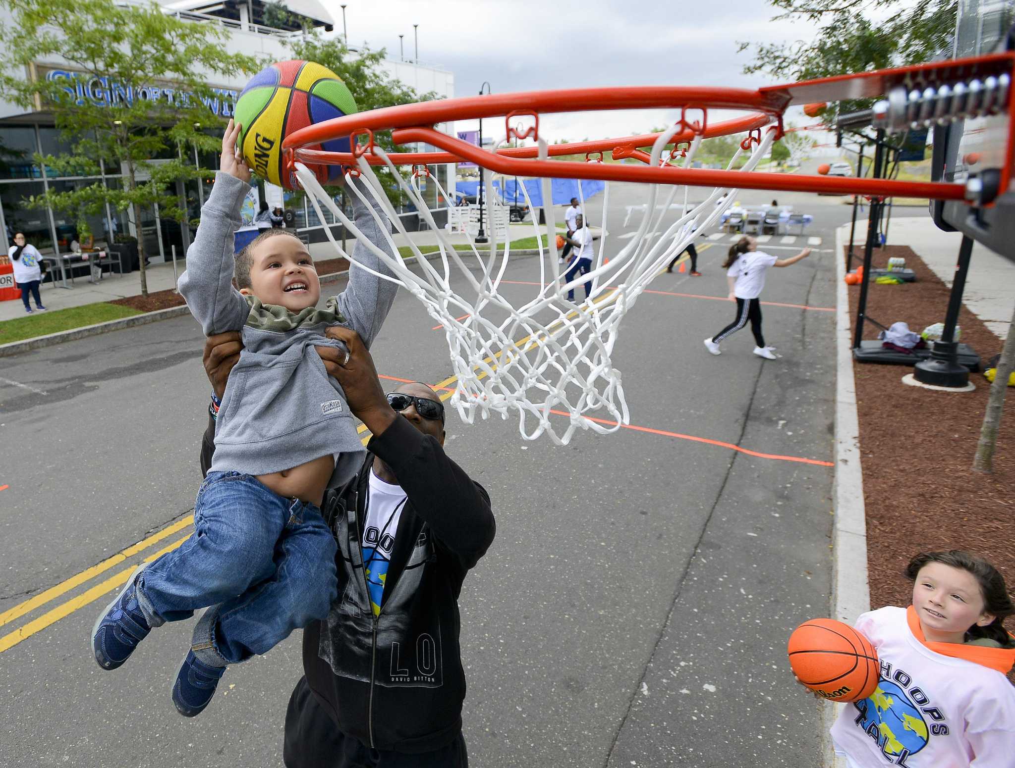 Stamford basketball block party brings social awareness to change