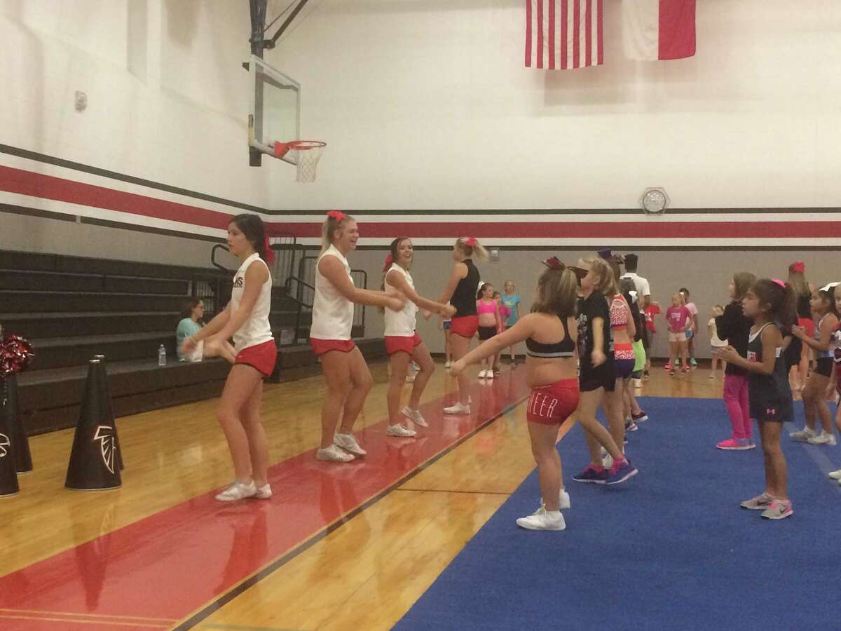 Huffman Hargrave cheer hosts kids' clinic