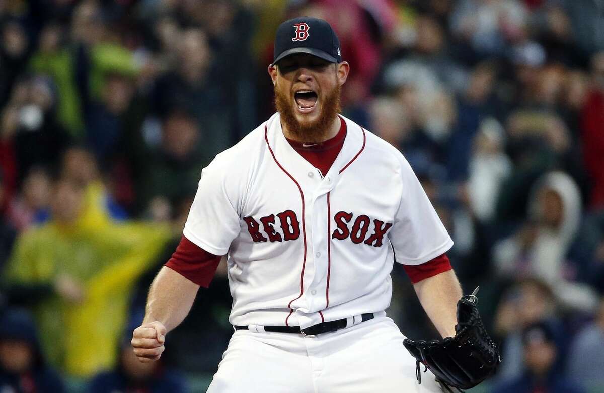 Boston Red Sox's Craig Kimbrel reacts after striking out Houston Astros' George Springer to clinch the American League East Division championship in a baseball game in Boston, Saturday, Sept. 30, 2017. (AP Photo/Michael Dwyer)