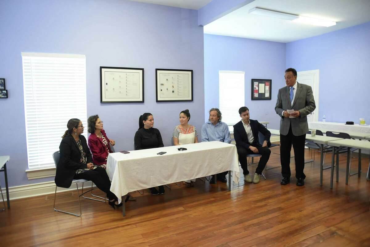 Businessman and politician Henry Cisneros leads a discussion about relief for Puerto Rico during a news conference at the Carol Burnett Center on Saturday. Seated at the table are Verlyn Maldonado (from left), executive director of American Sunrise; Cisneros’ wife, Mary Alice; Francheska Rios of Puerto Rico Rises-San Antonio; Liliana and Chris Mackenzie; and Alberto Altamirano of Cityflag. Cisneros is helping to facilitate relief help for Puerto Rico, which has suffered severe damage from hurricanes.