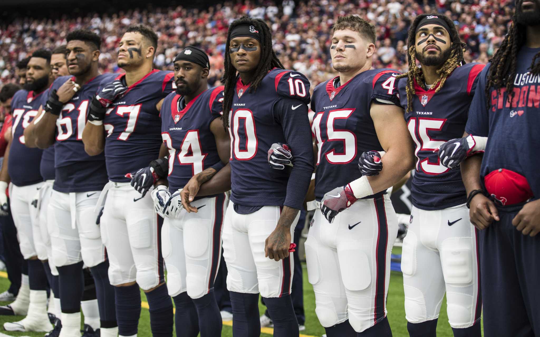 Texans Link Arms In Solidarity As Over 200 NFL Players Don't Stand For  Anthem – Houston Public Media