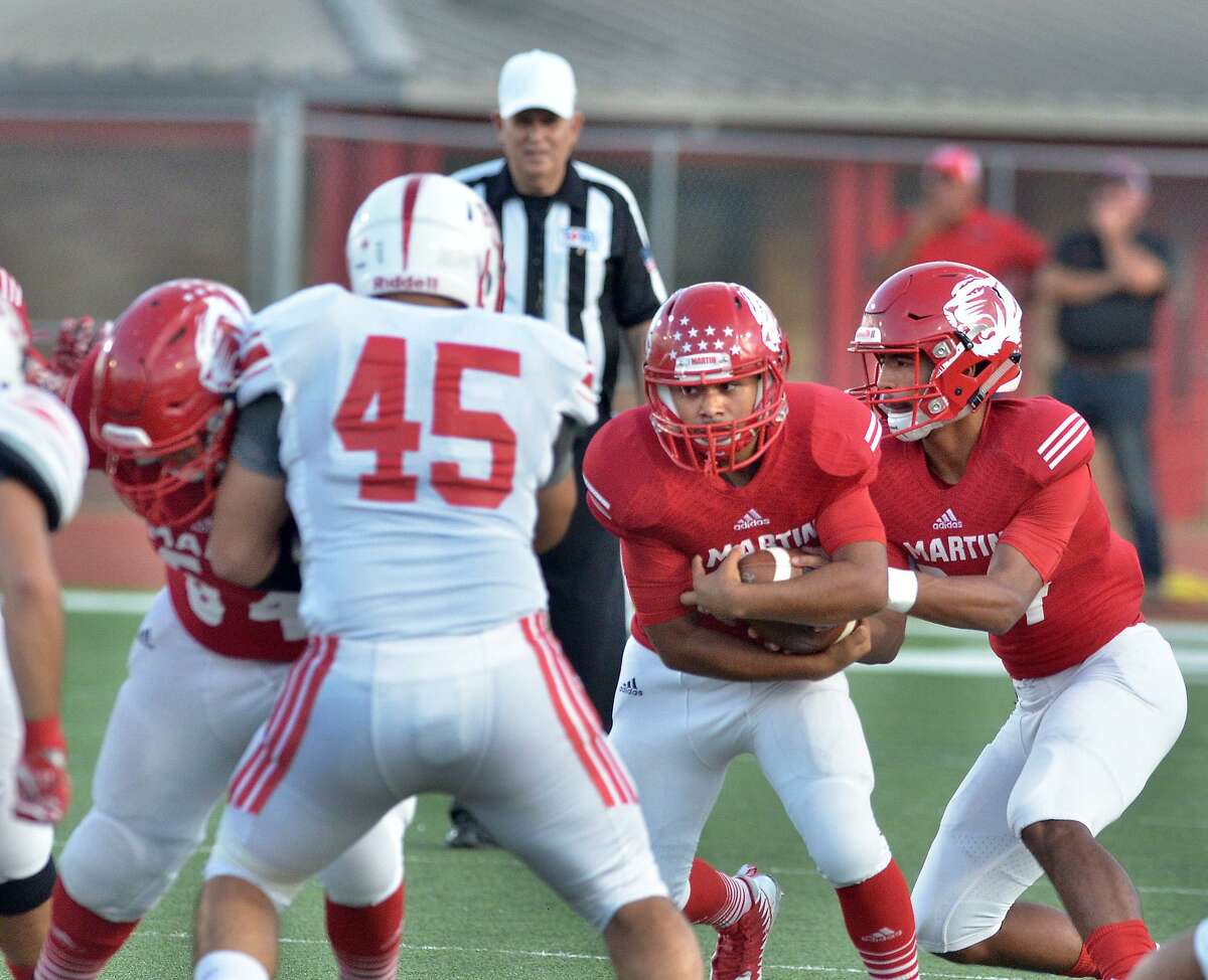 Martin quarterback Matthew Duron and the Tigers fell to Sharyland 45-28 on Friday.