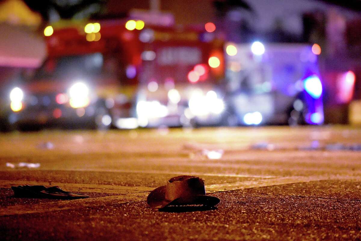 A cowboy hat lays in the street after a mass shooting at a Las Vegas concert that left dozens dead and hundreds injured. EDITOR'S NOTE: This slideshow contains images that may not be appropriate for all readers