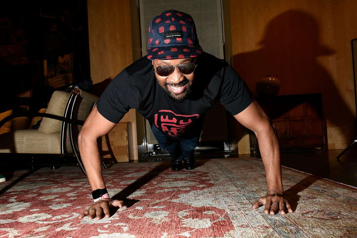 The RZA does push-ups back stage during a launch party for his clothing line, 36 Chambers, at the Asian Art Museum in San Francisco, Calif., on Thursday September 21, 2017.