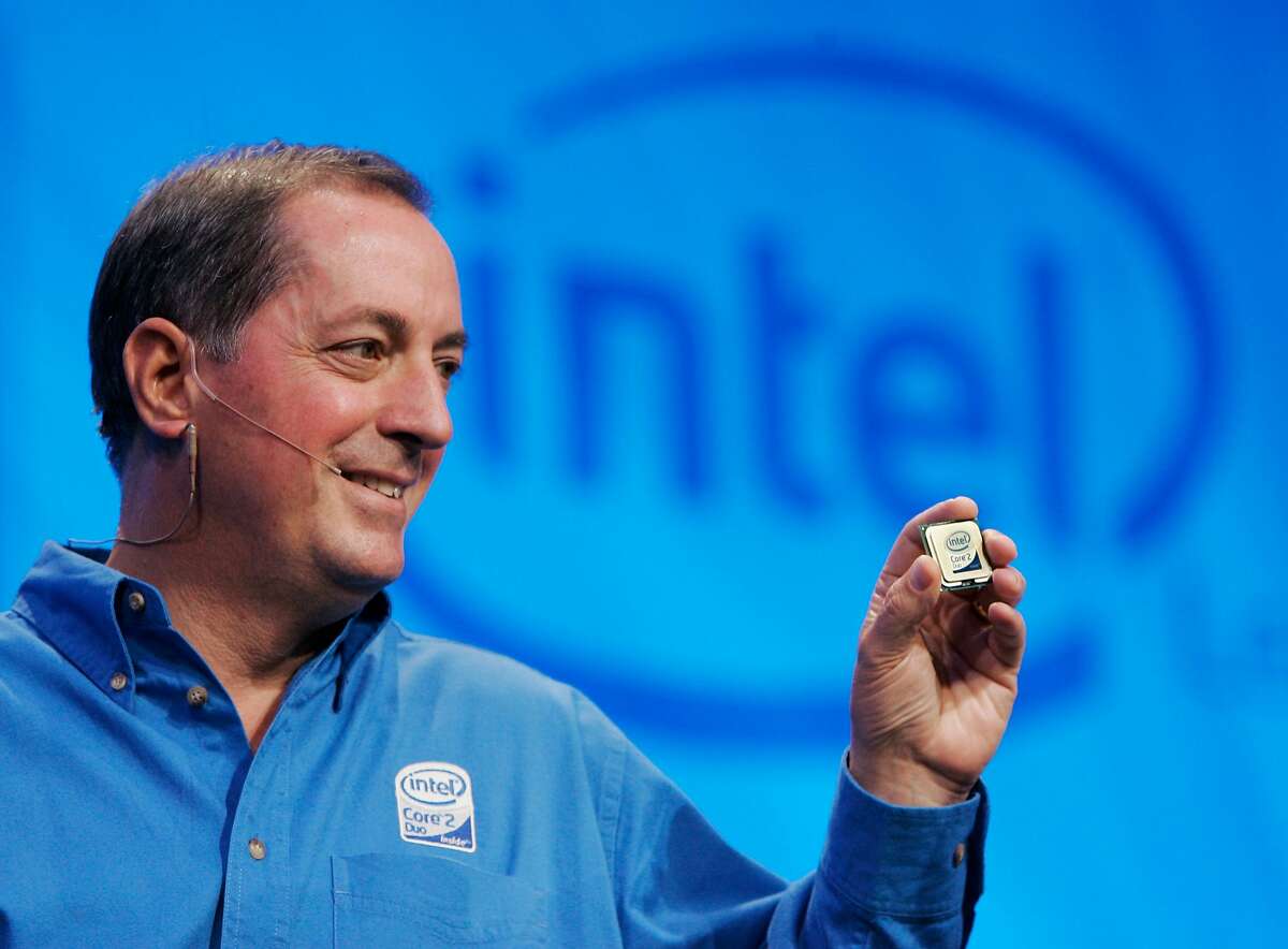 Intel Corp. CEO Paul Otellini holds up their newest chip at an unveiling at Intel headquarters in Santa Clara, Calif., Thursday, July 27, 2006. Otellini received compensation the company valued at $6.18 million in 2006, a year in which the company undertook a massive restructuring to reverse sinking profits but also fired back against its archrival with a strong new product lineup. Otellini got a 15 percent boost in his salary this year to $700,000, according to a filing Tuesday with the Securities and Exchange Commission. (AP Photo/Paul Sakuma)