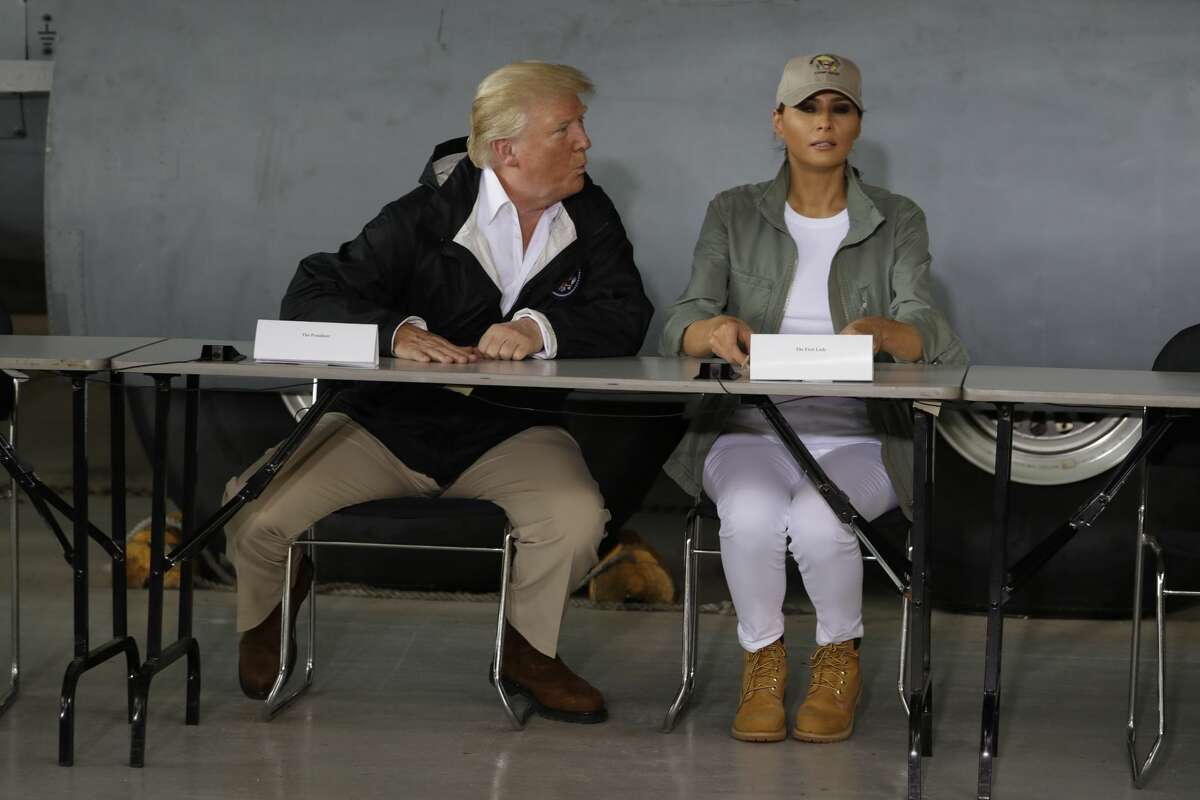 President Donald Trump and first lady Melania Trump attends a meeting after arrival at the Luis MuÃ±iz Air National Guard Base in San Juan, Puerto Rico, Tuesday, Oct. 3, 2017. Trump is visiting Puerto Rico in the wake of Hurricane Maria.(AP Photo/Evan Vucci)