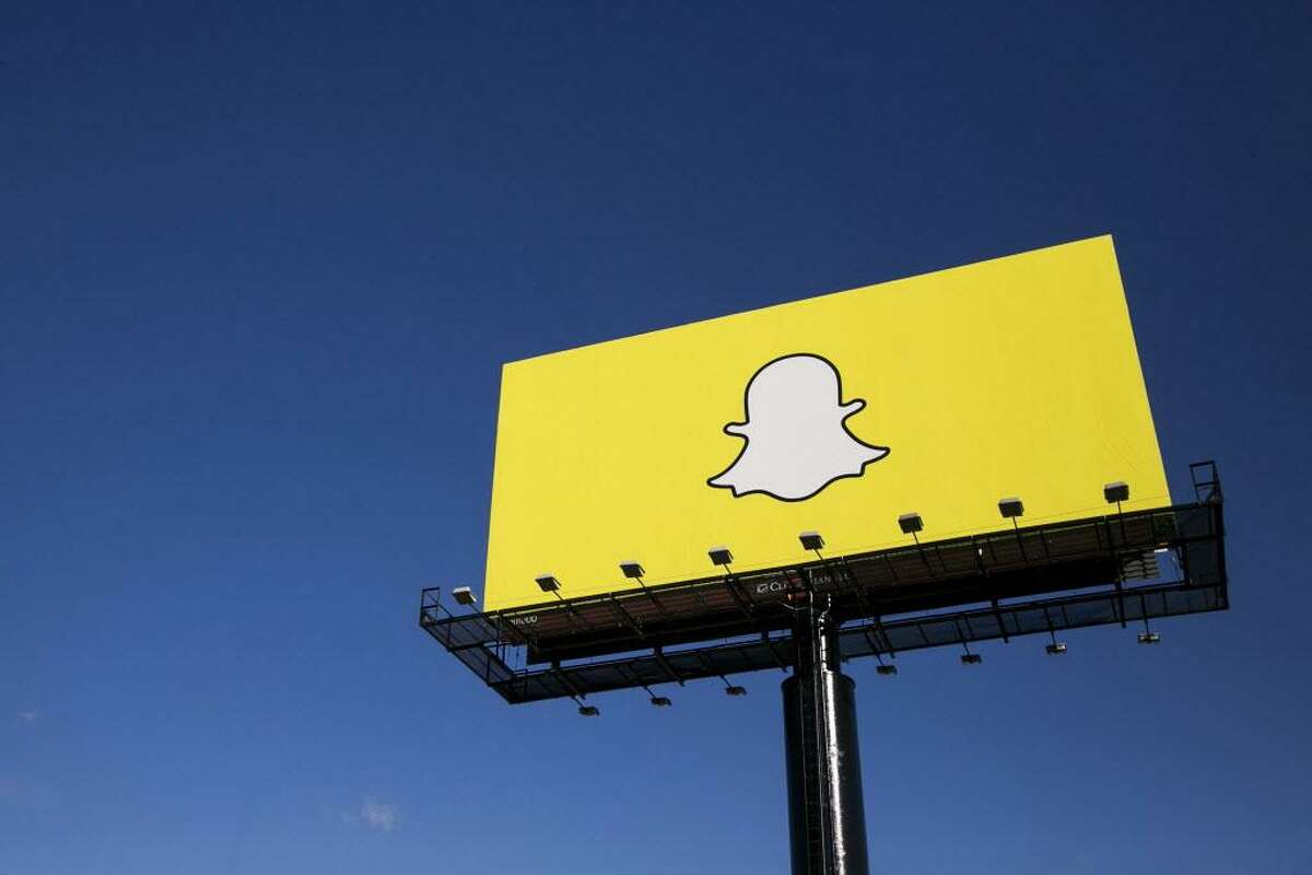 Snapchat is adding game scores and verified weather information as filters. (Kristoffer Tripplaar/Sipa USA/TNS)