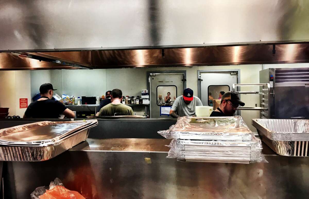Chefs and other volunteers prepared more than 250,000 meals at the Midtown Kitchen Collective.