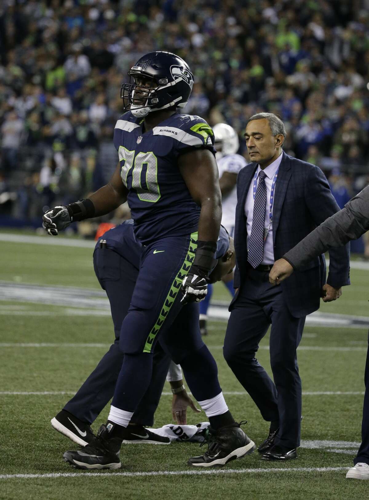 Seahawks' Offensive Line Faces Crushing Blow: Smith's Absence Throws Wrench in Playoff Hopes