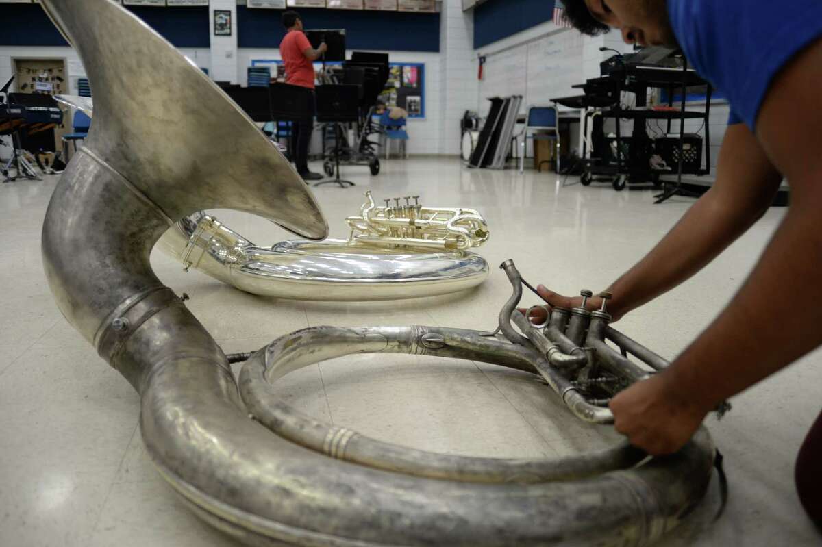 A Sam Rayburn High School senior assembles a school-owned sousaphone that dates to 1965. Pasadena ISD hopes to use $1 million from a $135 million bond package on the Nov. 7 ballot to purchase band and orchestra instruments.