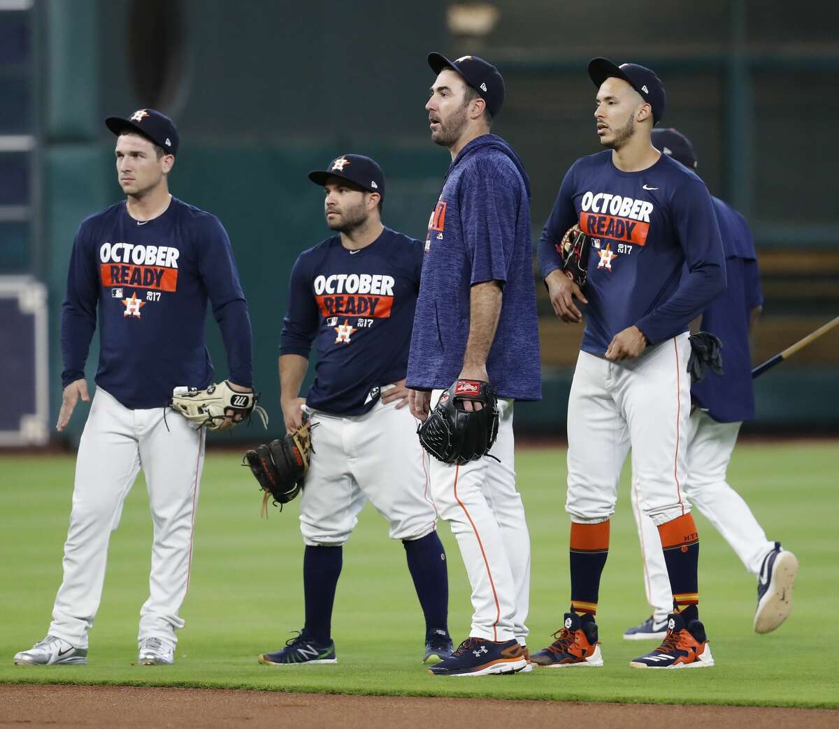 Houston Astros pitcher Justin Verlander chats with Carlos Correa, Jose Altuve, and Alex Bregman during batting practice at Minute Maid Park, Wednesday, Oct. 4, 2017, in Houston, as they prepare to take on the Boston Red Sox in the ALDS playoffs. ( Karen Warren / Houston Chronicle )