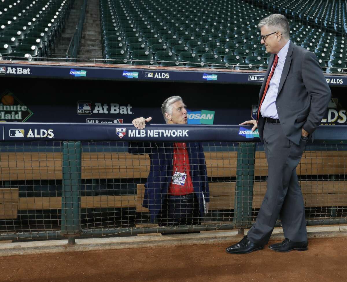Houston Astros GM Jeff Luhnow chats wih Boston Red Sox GM Dave Dombrowski during the batting practice at Minute Maid Park, Wednesday, Oct. 4, 2017, in Houston, as they prepare to take on the Boston Red Sox in the ALDS playoffs. ( Karen Warren / Houston Chronicle )
