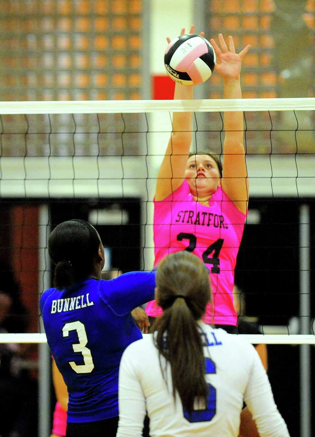 Stratford's Samantha Carbone blocks a spike by Bunnell's Kayla Sokunle during girls volleyball action in Stratford, Conn. on Wednesday, Oct. 4, 2017.