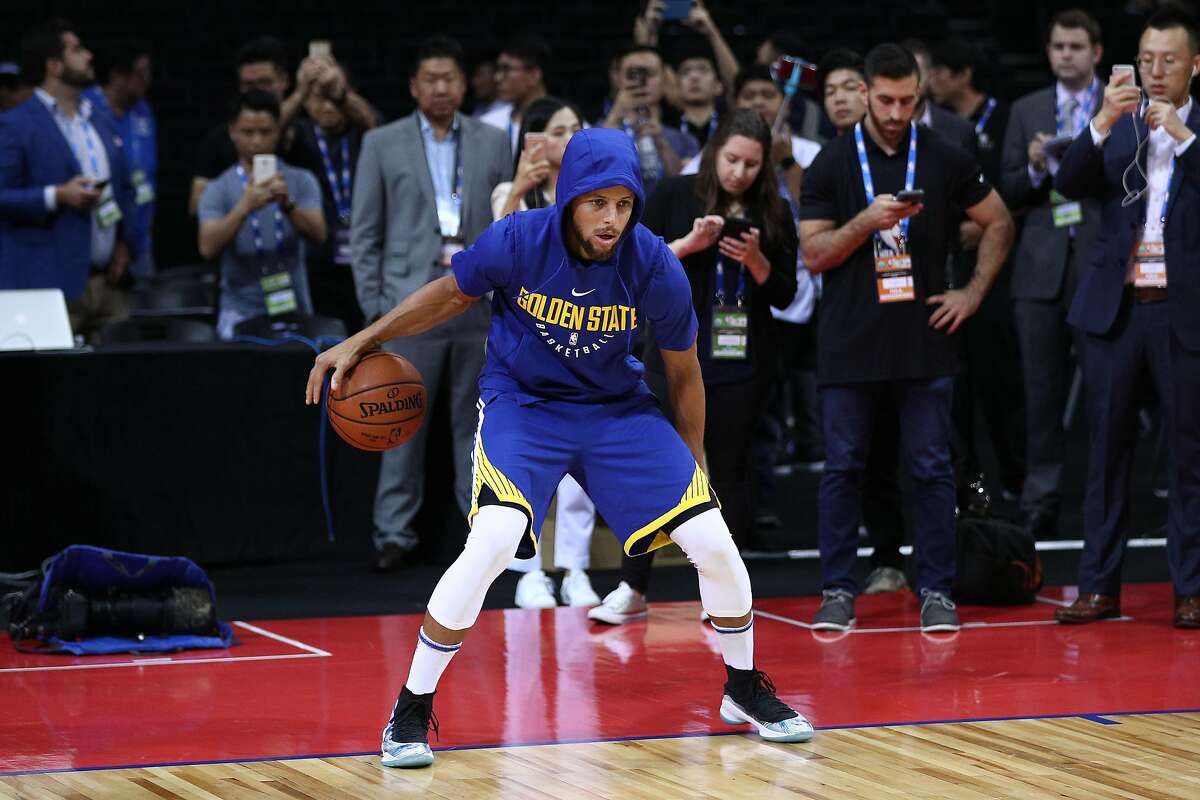 Stephen Curry of the Golden State Warriors warms up before the game between the Minnesota Timberwolves and the Golden State Warriors as part of 2017 NBA Global Games China at Universidade Center on October 5, 2017 in Shenzhen, China.
