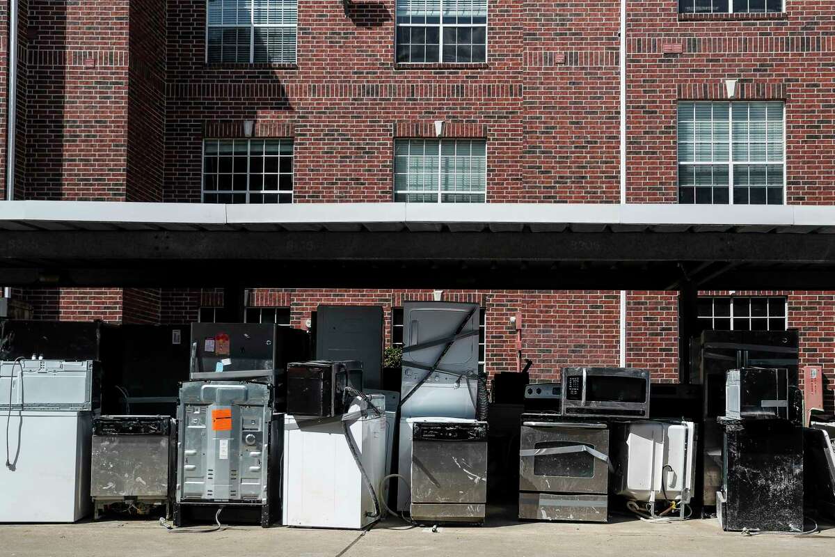 Appliances sit outside buildings at The Grand on Memorial which flooded during Hurricane Harvey Wednesday, Oct. 4, 2017 in Houston. ( Michael Ciaglo / Houston Chronicle)