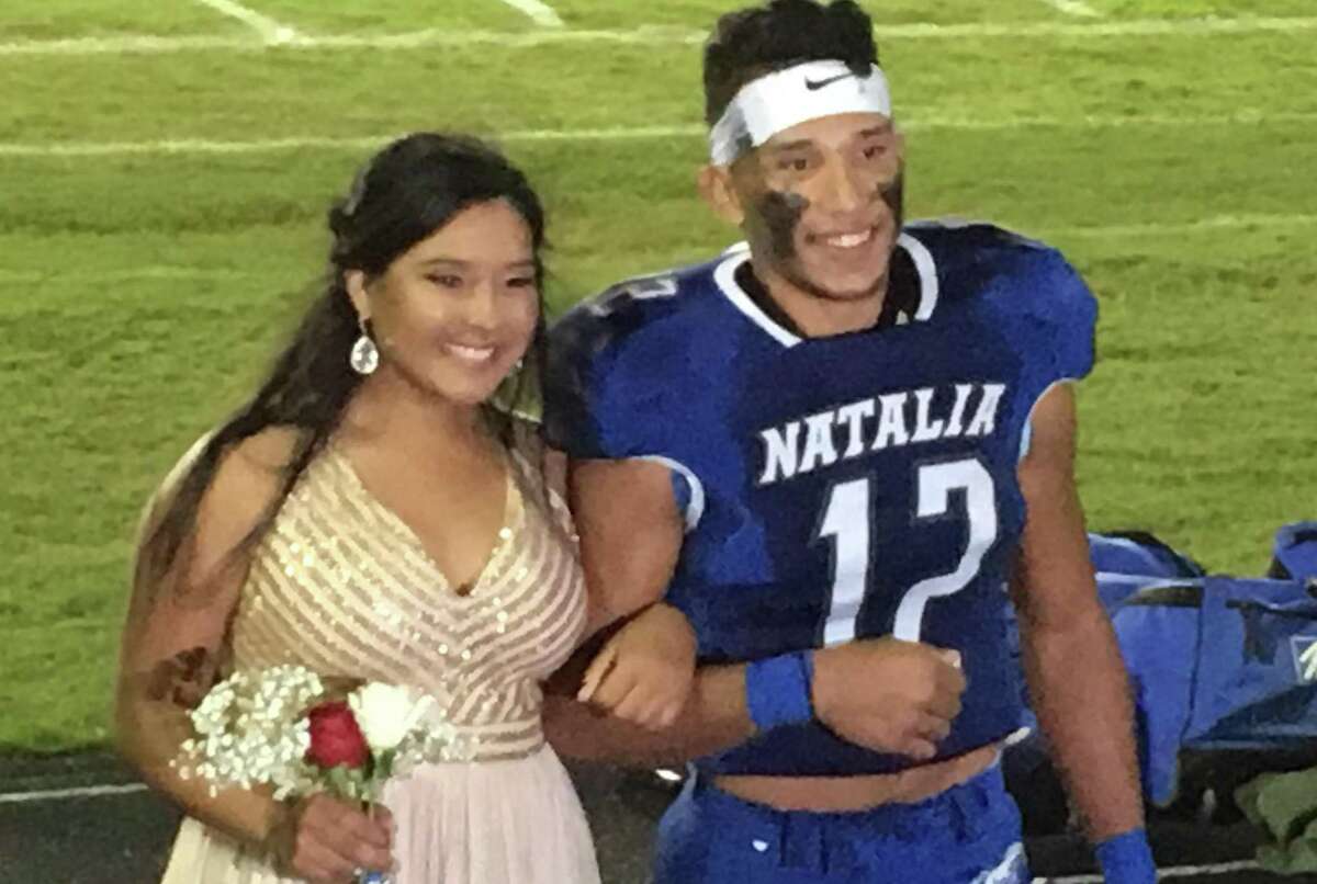 Ray Rizo, posing with queen Trinity Vera, was named homecoming king at halftime last week.