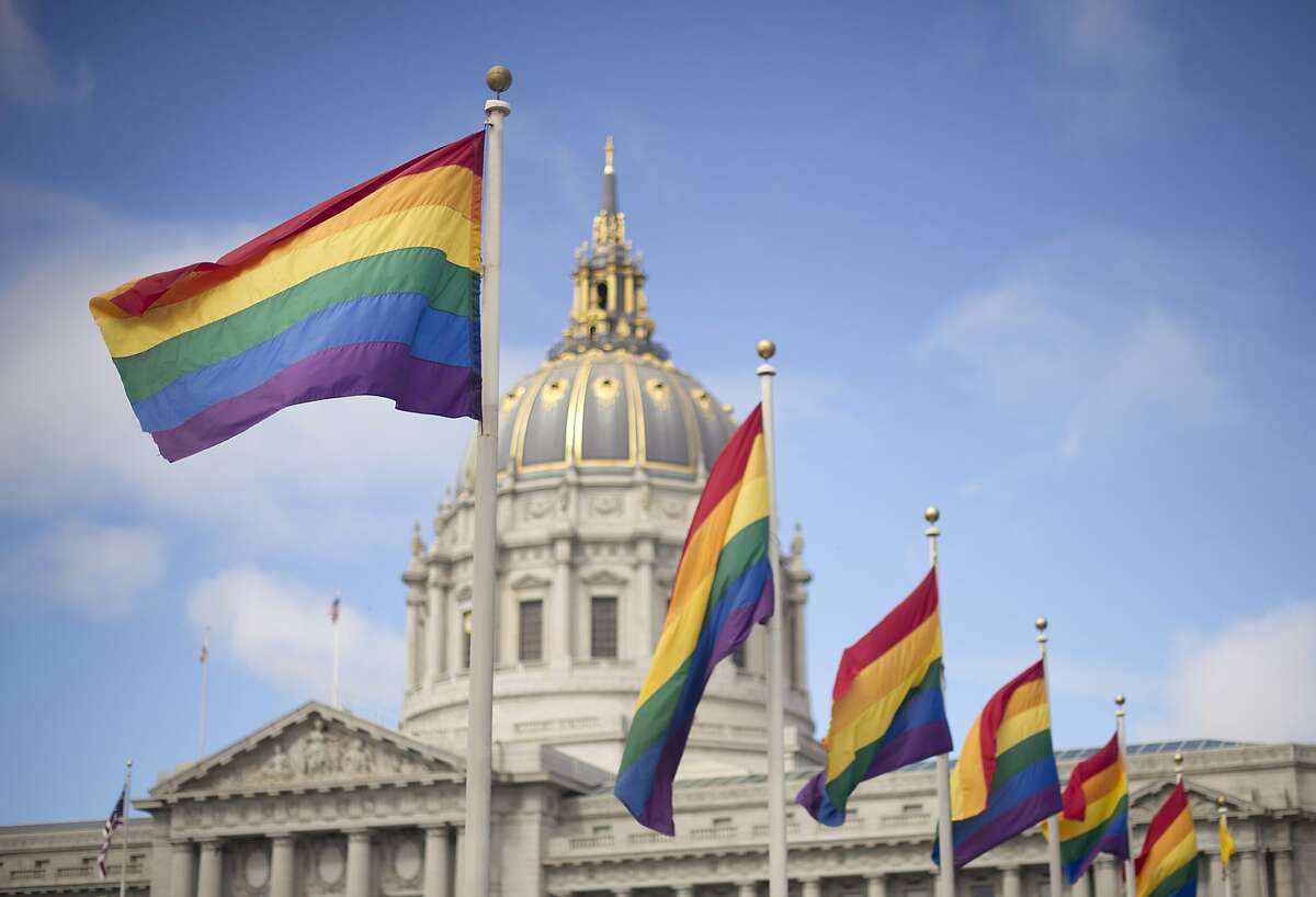 Rainbow flags fly in front of San Francisco City Hall, Wednesday, June 26, 2013, shortly after the U.S. Supreme Court decision that cleared the way for same-sex marriage in California. (AP Photo/Noah Berger)