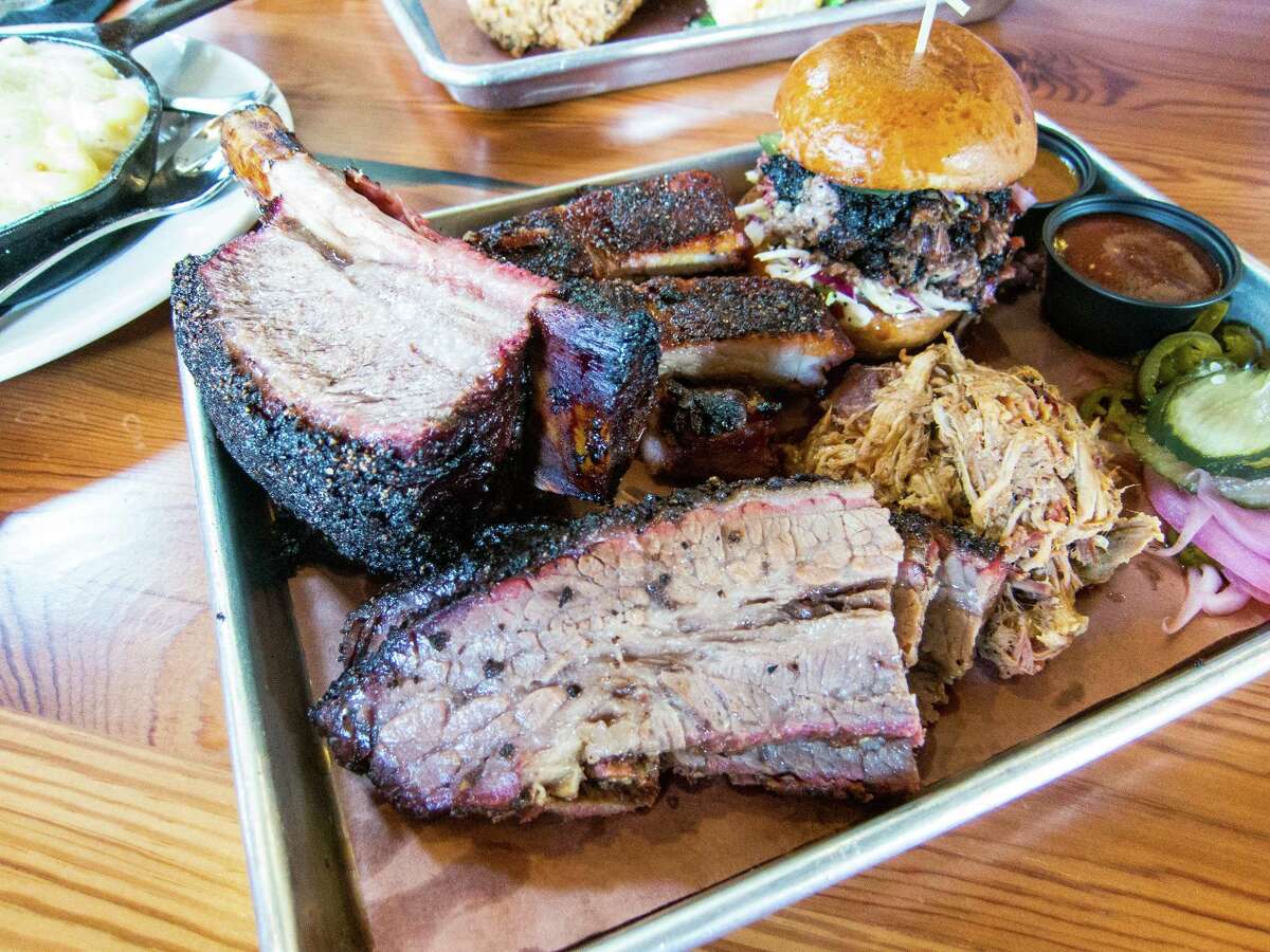 Eat barbecue   No doubt your guest has heard too much about Houston's barbecue scene. A barbecue sampler at Beaver's on Westheimer is good place get the meat party started. They've been racking up plenty of awards and this location has a pretty backyard for day drinking.