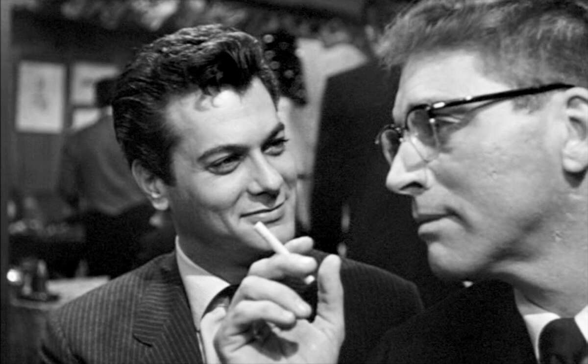 Tony Curtis and Burt Lancaster co-star in the 1957 drama "Sweet Smell of Success."