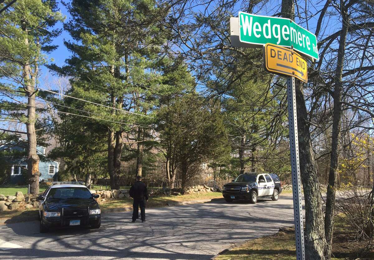 Police at the scene Tuesday, March 22, 2016, where an officer shot a man on Wedgemere Road in Stamford, Conn. last night. The man has been identified as 25-year-old Dylan Pape of 119 Wedgemere Road, a state police release says.