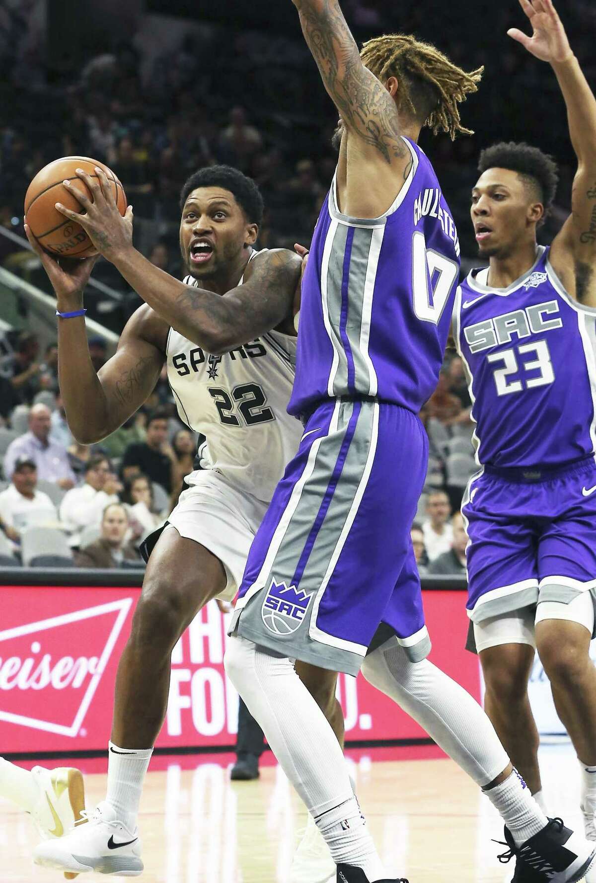 Rudy Gay tangles up the defense on the floor as the Spurs play the Kings at the AT&T Center on October 6, 2017.