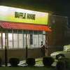 BILOXI,MS-OCTOBER 7, 2017: Waffle House employees take a smoke break at their restaurant which sits 75 feet from the beach as the eye of Hurricane Nate pushes ashore in Biloxi, Mississippi October 7, 2017.Hurricane Nate is expected to make landfall on the Mississippi Gulf coast near midnight local time. (Photo by Mark Wallheiser/Getty Images)