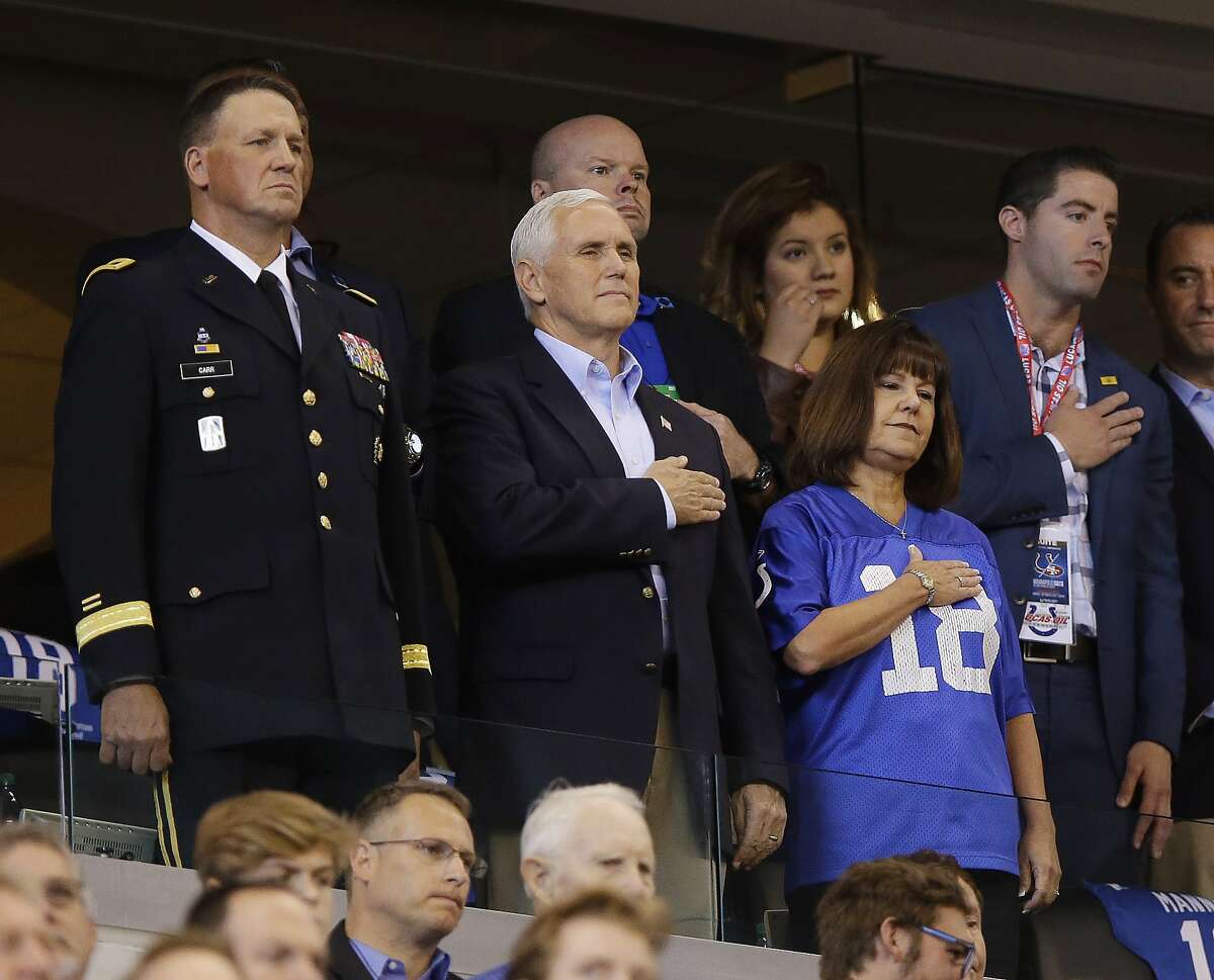 Vice President Mike Pence stands during the playing of the national anthem before an NFL football game between the Indianapolis Colts and the San Francisco 49ers, Sunday, Oct. 8, 2017, in Indianapolis. (AP Photo/Michael Conroy)