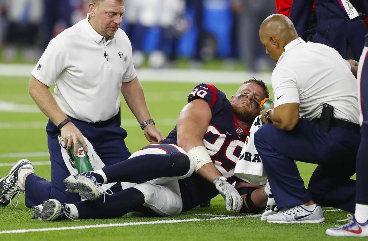 Houston Texans defensive end J.J. Watt (99) lays on the field hurt during the first quarter of an NFL football game at NRG Stadium on Sunday, Oct. 8, 2017, in Houston. ( Brett Coomer / Houston Chronicle )