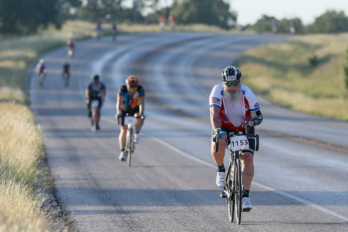 Cyclists make their way down FM 2272 near Canyon Lake in the 28th Annual Bike MS: Valero Ride to the River on Sunday, Oct. 8, 2017. More than 1,600 cyclists were expected to raise over $1.5M in the two-day event, riding up to 161-miles from San Antonio to New Braunfels, to help people affected by MS. MARVIN PFEIFFER/mpfeiffer@express-news.net