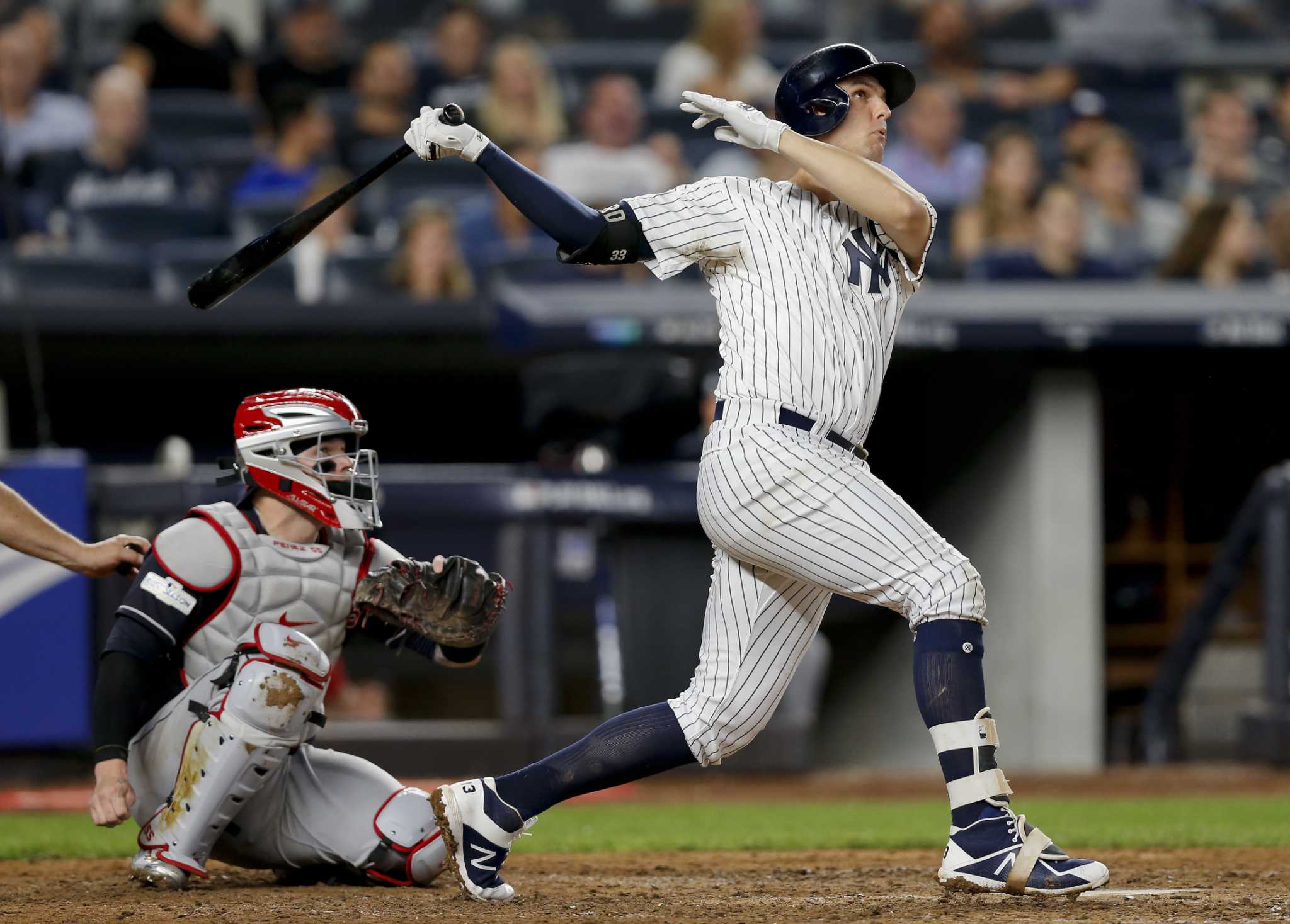 Jose Ramirez fields a ball hit by Yankees shortstop Starlin Castro