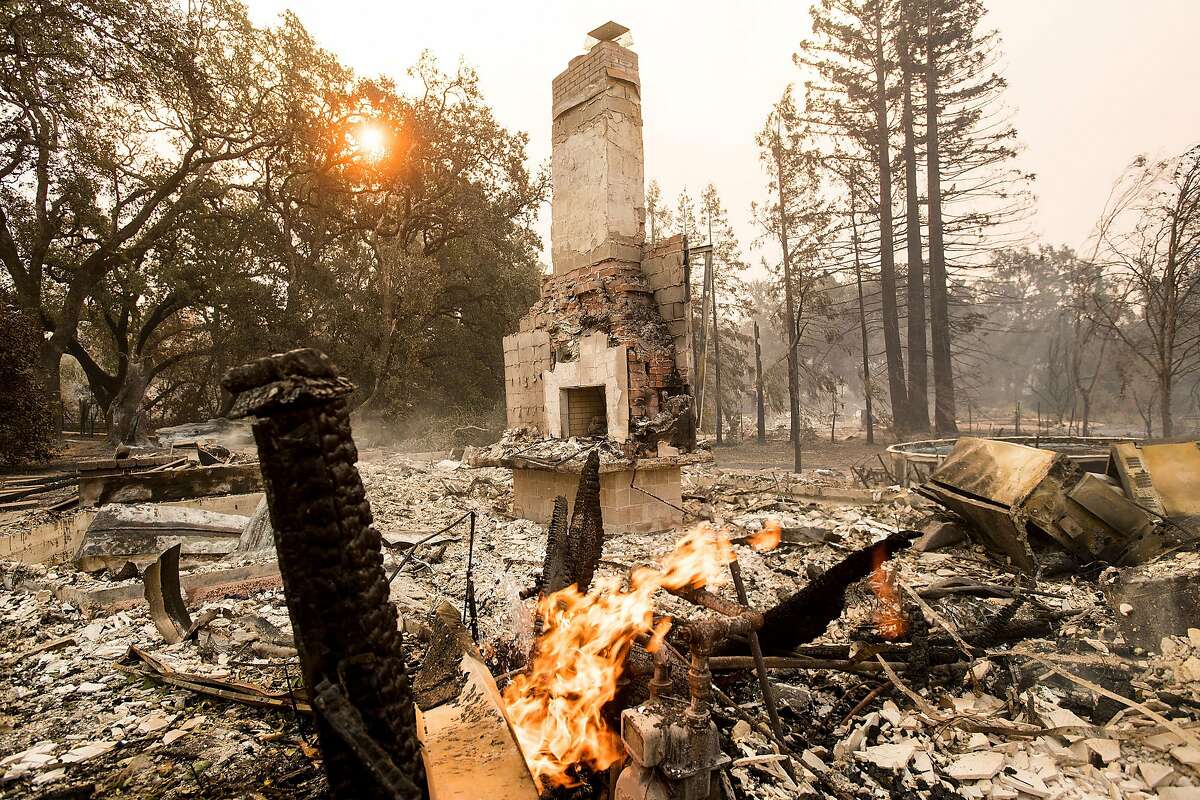 A chimney stands at a residence leveled by fire in Glen Ellen, Calif., on Monday, Oct. 9, 2017.