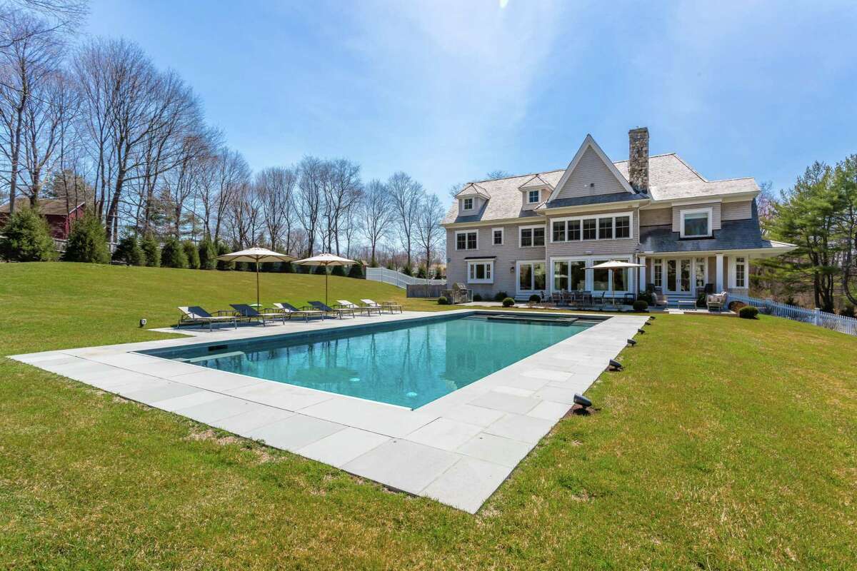 On the Market / Front porch welcoming entry point for Westport mansion