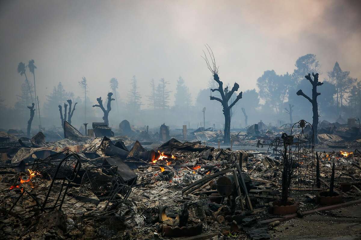 Homes are seen burnt to the ground after a fire tore through the Journey's End mobile home park on Mendocino Avenue in Santa Rosa, Calif., on Monday, Oct. 9, 2017.