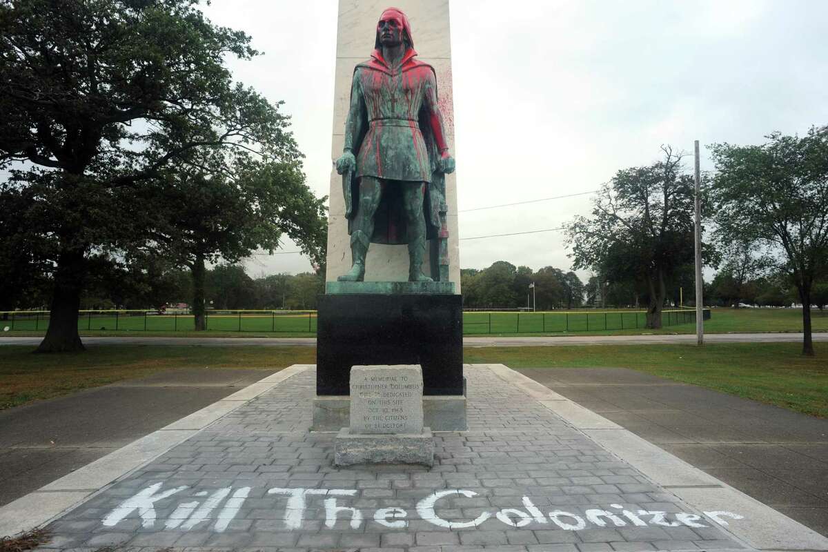 The statue of Christopher Columbus in Bridgeport, Conn.?’s Seaside Park has been vandalized, seen here on Columbus Day, Oct. 9, 2017.