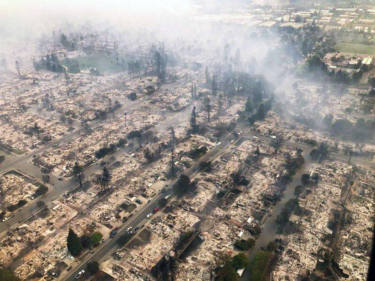 This image provided by the California Highway Patrol shows destruction in Santa Rosa's Coffey Park neighborhood on Monday, October 9, 2017.
