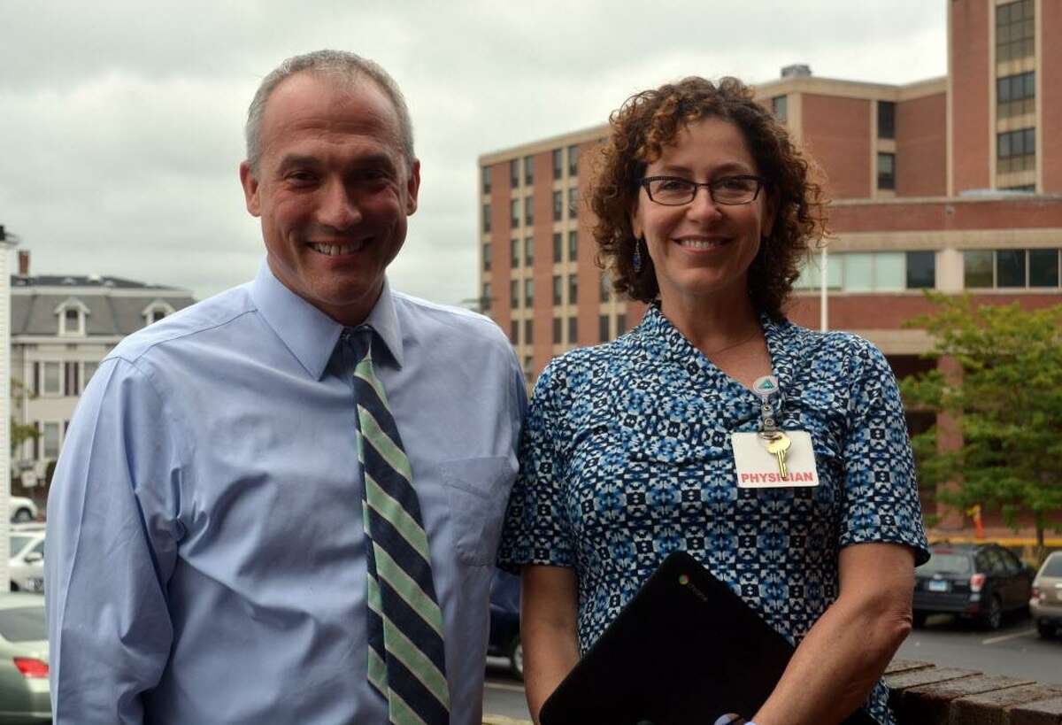 Middlesex Hospital physicians Jeffrey T. Shelton, chief of psychiatry, and Rachel I. Lovins, chairwoman of the department of medicine at the Middletown facility, cochair the hospital’s new opioids committee.