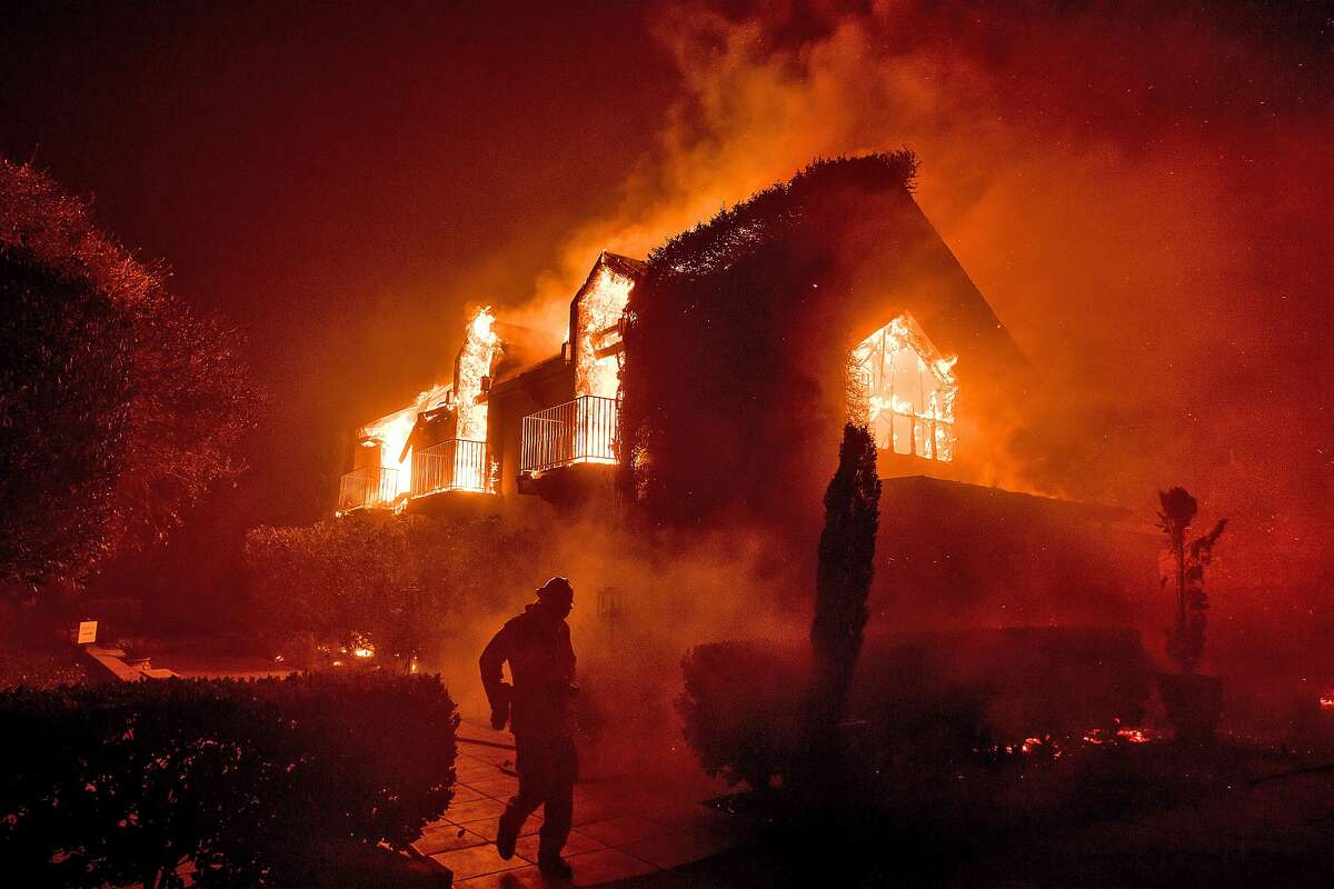 Flames consume a main building at the Signorello Vineyards in Napa, Calif., on Monday, Oct. 9, 2017.