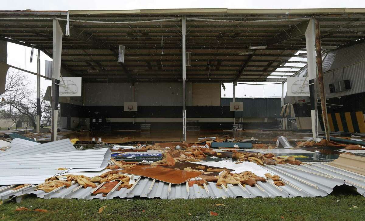 The Rockport-Fulton High School gym shows extensive damage in the aftermath of Hurricane Harvey in Rockport in this Aug. 26 photo. State officials estimate it will cost Texas taxpayers $1.64 billion over the next two years to help schools ravaged by Hurricane Harvey rebuild and avoid financial loses, according to recently released documents.