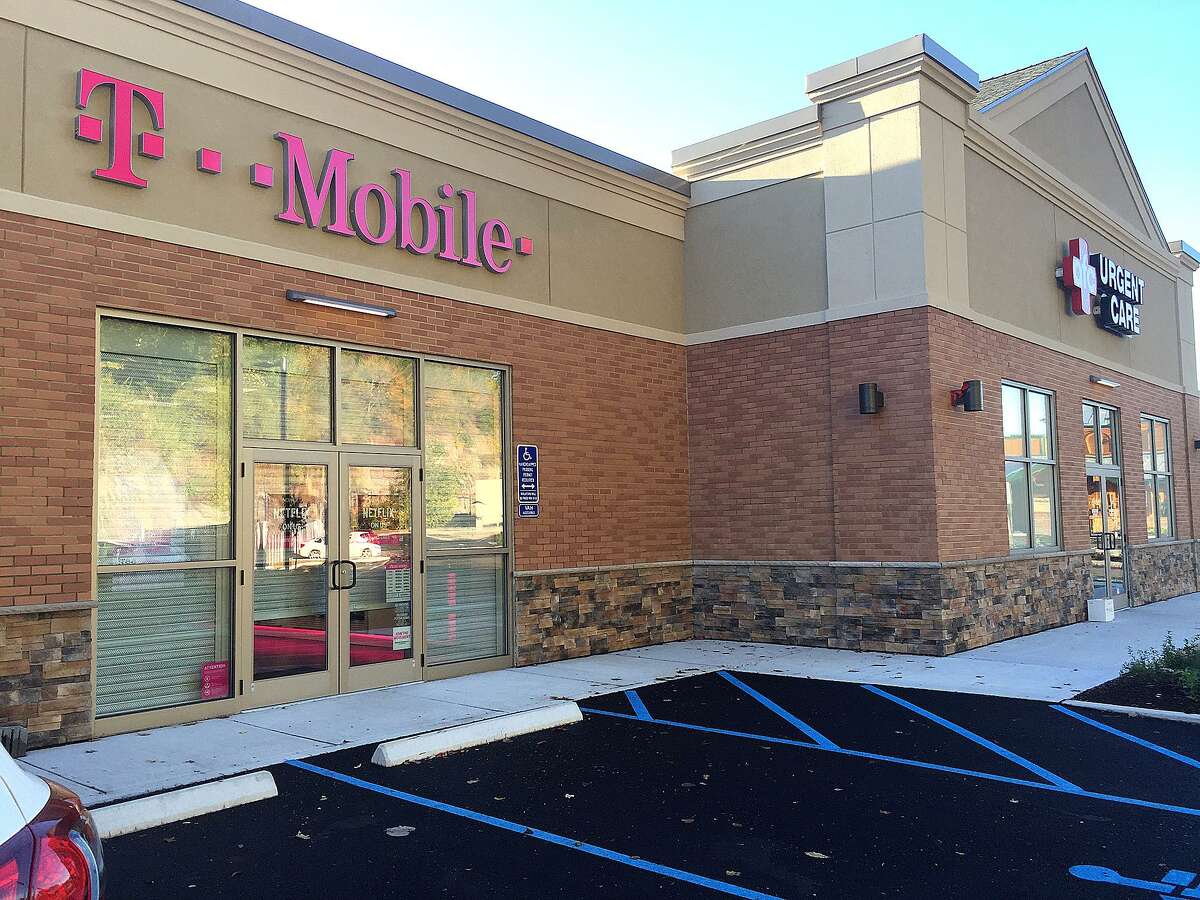 76 Newtown Road: T-Mobile has opened its third location in Danbury, the latest store being in the new plaza that also includes AFC Urgent Care and Aspen Dental. The newly developed lot on Newtown Road also includes Texas Roadhouse and Popeyes Louisiana Kitchen, which is slated to open later this year. T-Mobile, a provider of cell phones and cell service, also has two locations on Backus Avenue, one of which is in Danbury Fair mall.