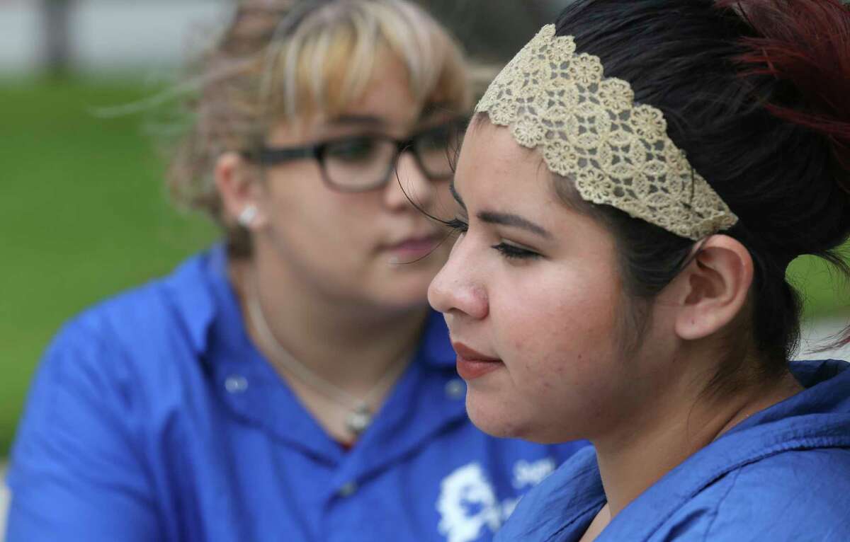 Cassandra Austra, 19, left, and Tiffany Silva, 21, reflect on the Texas Tech University shooting, while on a lunch break at the town square in Seguin, Texas, Tuesday, Oct. 10, 2017. Freshman Hollis Daniels, 19, is accused of capital murder in the death of a university police officer Monday night. “No matter what your background is, there’s no need to take it out on someone else,” Austra said, “especially someone putting their life on the line.”