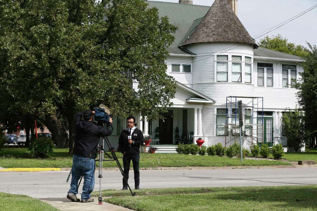 A television crew sets up a shot in front of the Daniels’ residence in Seguin, Texas, Tuesday, Oct. 10, 2017. Texas Tech University freshman Hollis Daniels, 19, is accused of capital murder in the death of a university police officer, Monday night. Daniels grew up in Seguin and his family owns the Palace Theater where he worked.