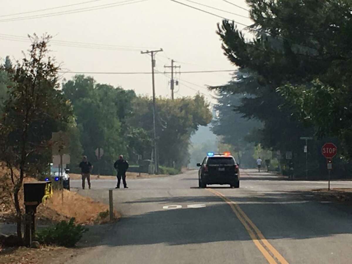 The California Highway Patrol closes , Green Valley Road at Rockville Road on Solano County during the Atlas Fire on Tuesday, October 10, 2017.